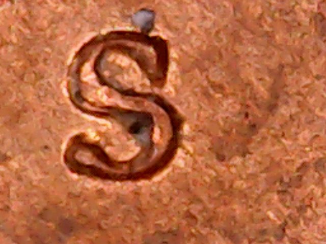 Serifs-Are-Difficult-To-Make-Out-Could-One-Be-Here-On-This-Cent?